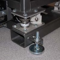 The vibrating table stands on load cells.