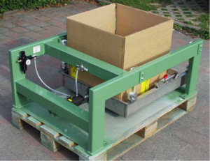 Use a compaction table to settle material in bins or boxes before shipping.