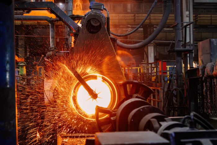Iron pipe centrifugal pipe casting machine at the foundry.